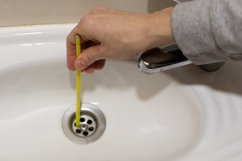 5 Things To Try If You Have A Noisy Shower Or Bathroom Sink Drain - How To Properly Snake A Bathroom Sink