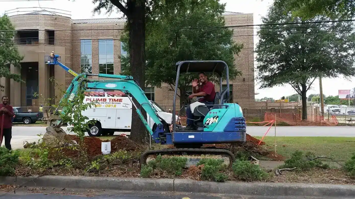 replace-sewer-line-south-carolina-excavation-crew Replace sewer line day in South Carolina: our crew, our excavator, and open ground done right
